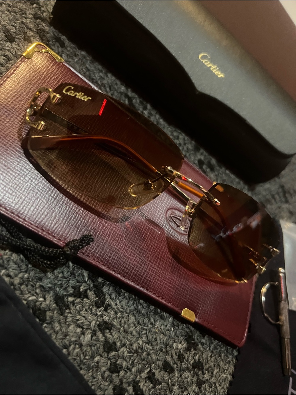 Cartier Men’s Rimless Sunglasses in Brown with Gold Accents